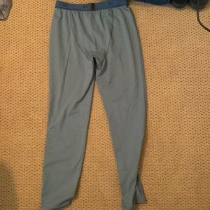 REI green ski pants in medium.